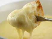 Bread Dipped in Melted Cheese